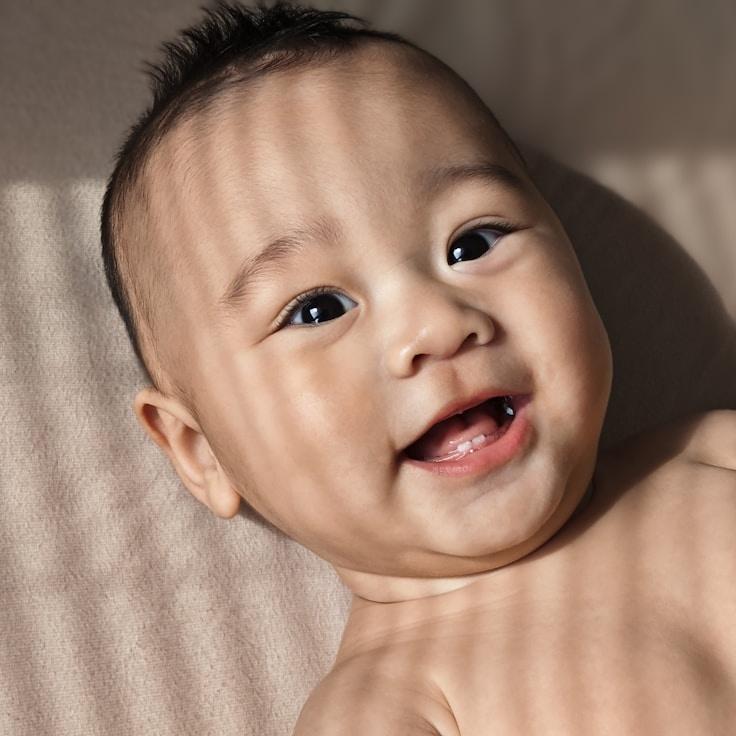 Avery Chen, Lead Design Curator at Global Mindful Journey, reviewing corporate floral arrangements